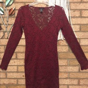Woman’s long sleeve red lace dress